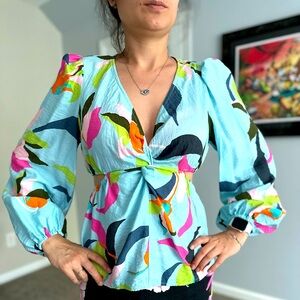 Long sleeve floral shirt with side cutouts